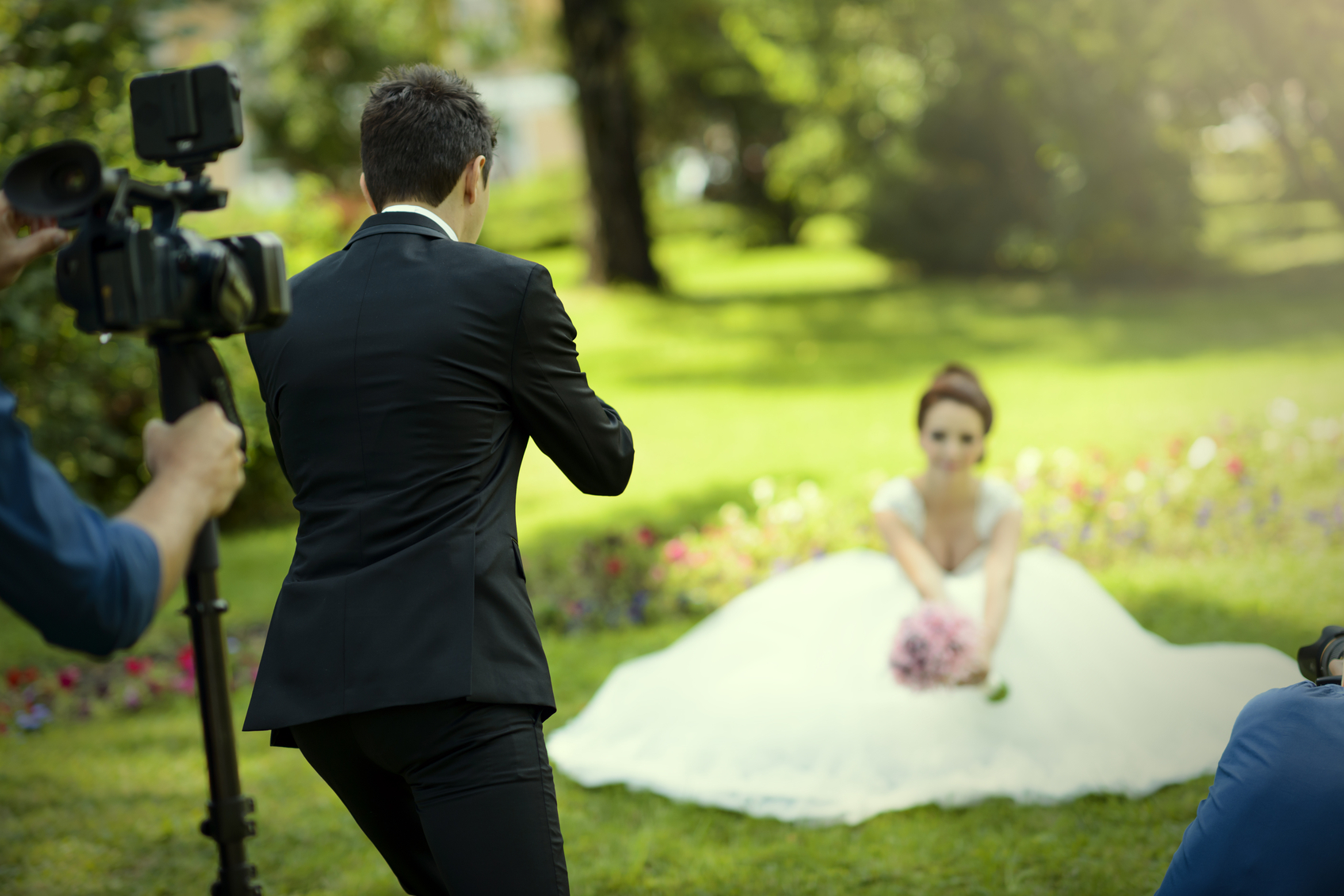groom photographing his bride Epic Events by Booth, Inc. - Photography Services - Wedding